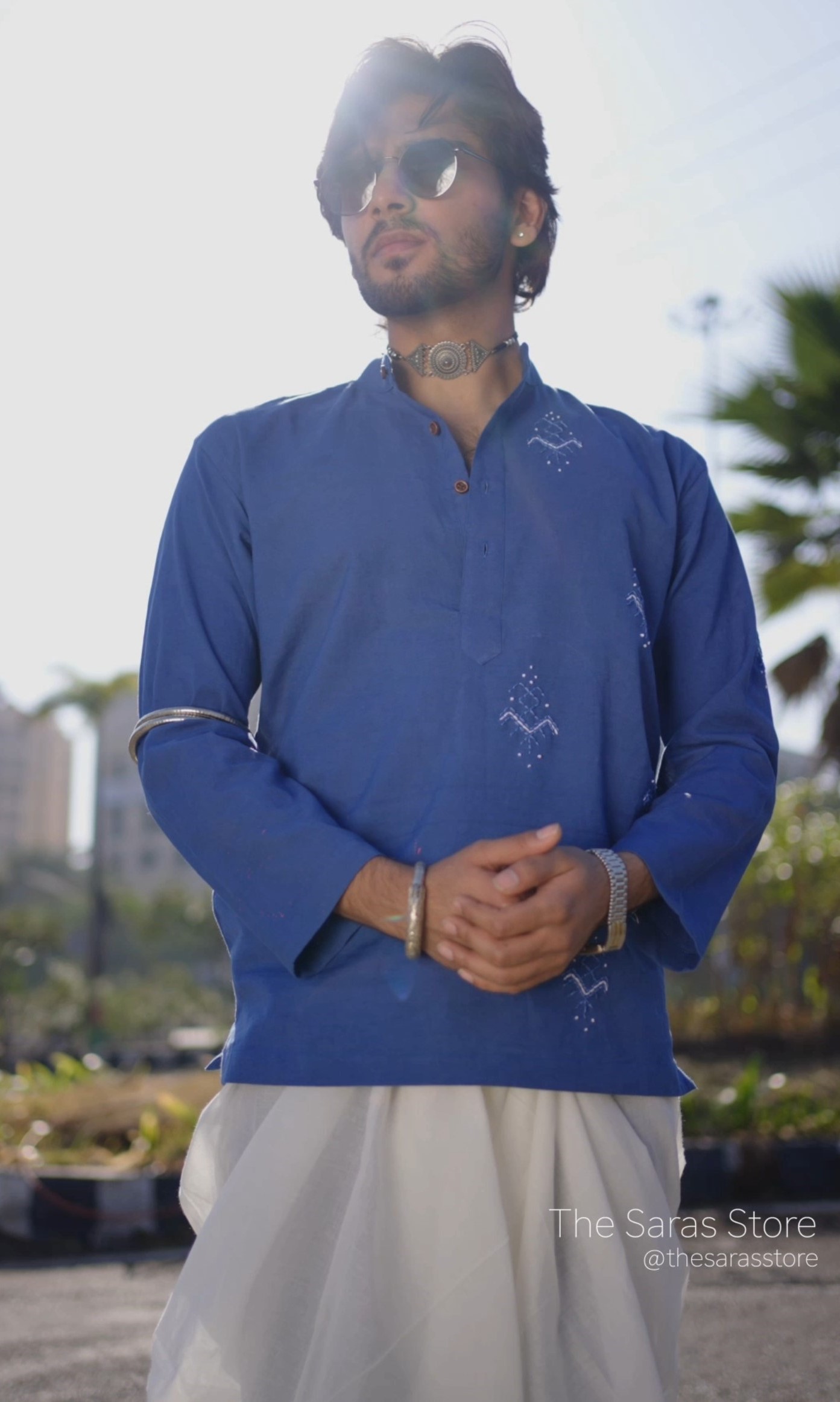 Blue modern kurta shirt by The Saras Store Bhopal menswear brand worn in outdoor setting
