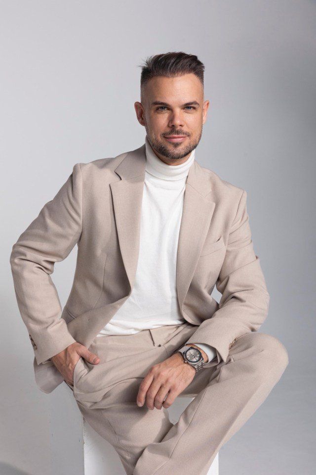 Ivan Martinec, founder of Success Unity, wearing a beige suit